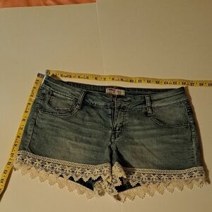 Lei Blue Jean Shorts with Distressed Hem and Lace Trim